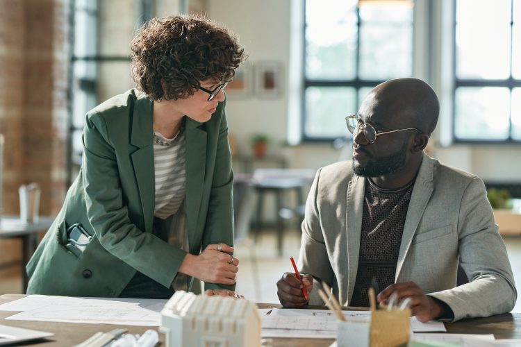 Couple of architects working in team